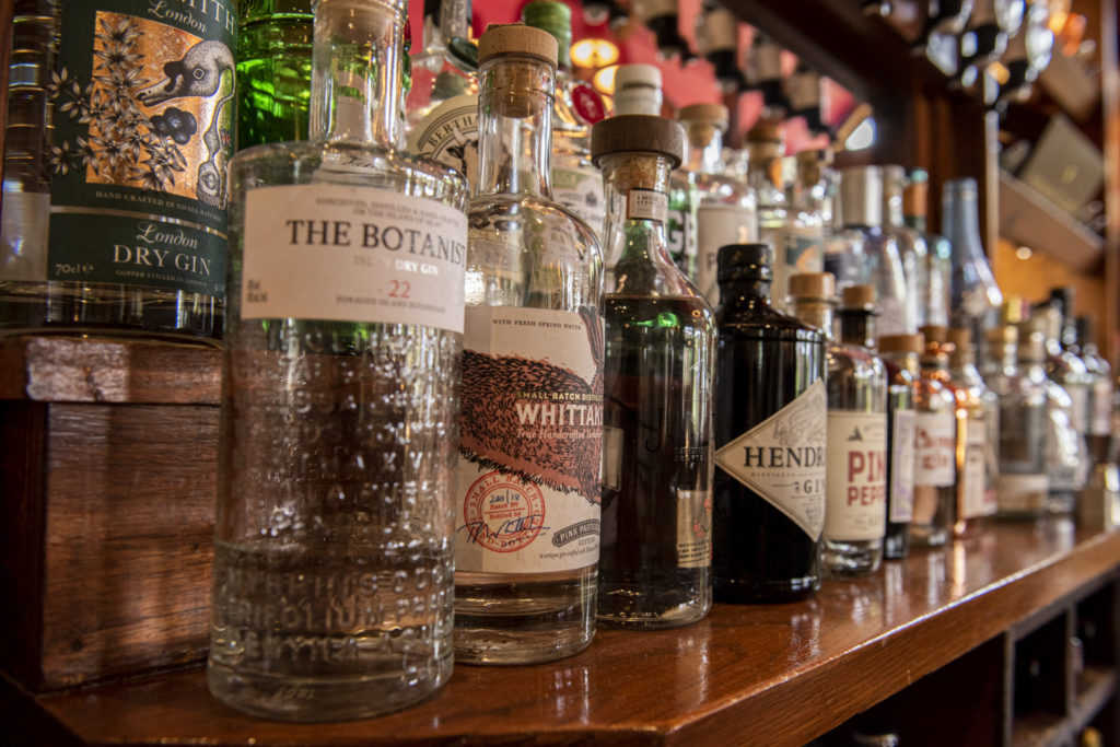 Bar shelf displaying a selection of drinks at The Cambria