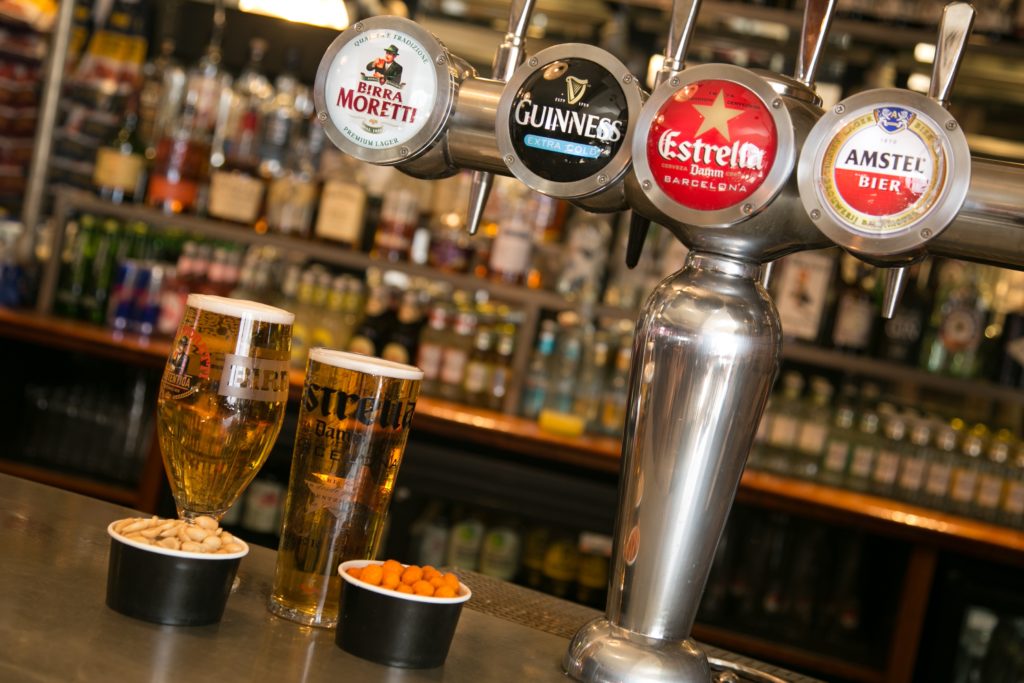 Beer taps and drinks on the bar at The Cambria